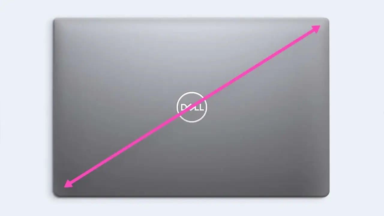 Flèche rose sur un ordinateur portable Dell, montrant la diagonale pour savoir comment connaitre la taille de son écran pc.