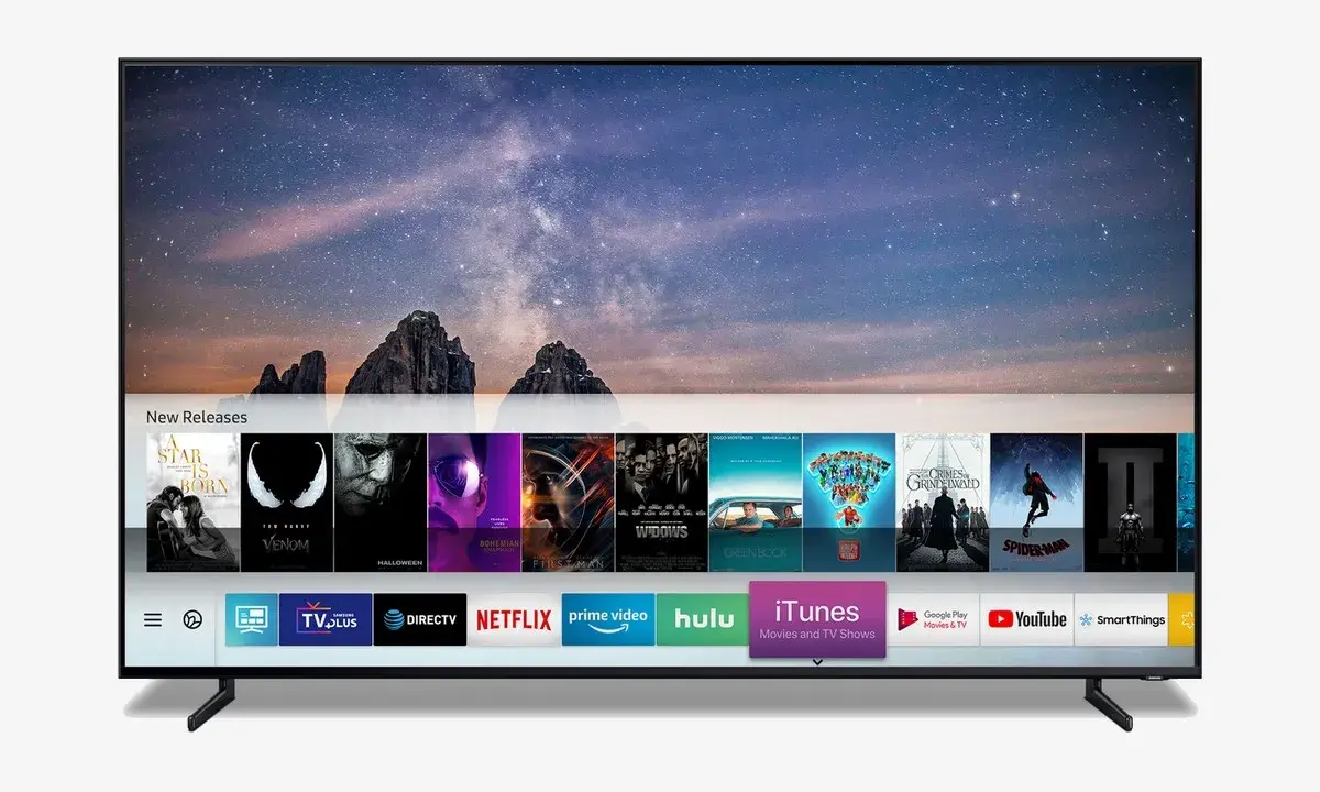Écran de smart TV affichant des films récents et des applications de streaming. Un avis sur cette smart TV serait pertinent.