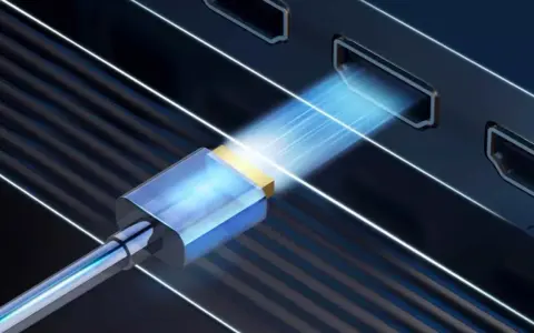 Connexion HDMI pour projeter l'écran de votre PC sur une TV HD. Le câble bleu et or s'insère dans un port, symbolisant le transfert de données.