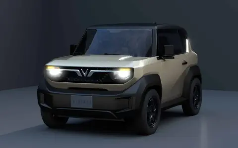 Le VinFast VF3, un SUV compact et audacieux, se présente avec un design distinctif, des phares LED lumineux et une allure robuste.