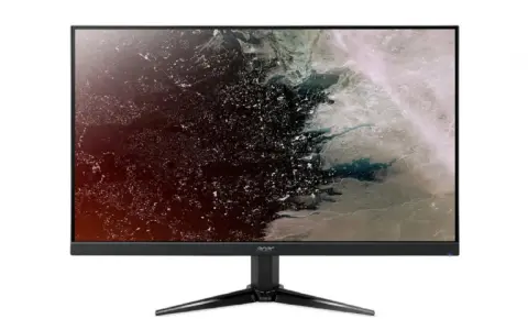 Écran Acer 24 pouces affichant une image abstraite aux teintes sombres et claires, évoquant une nébuleuse ou une carte terrestre vue du ciel.