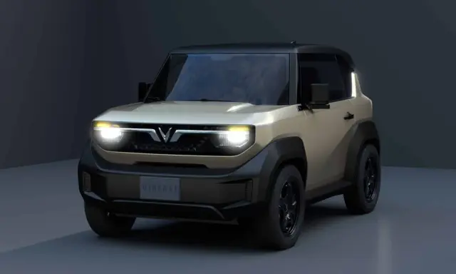 Le VinFast VF3, un SUV compact et audacieux, se présente avec un design distinctif, des phares LED lumineux et une allure robuste.